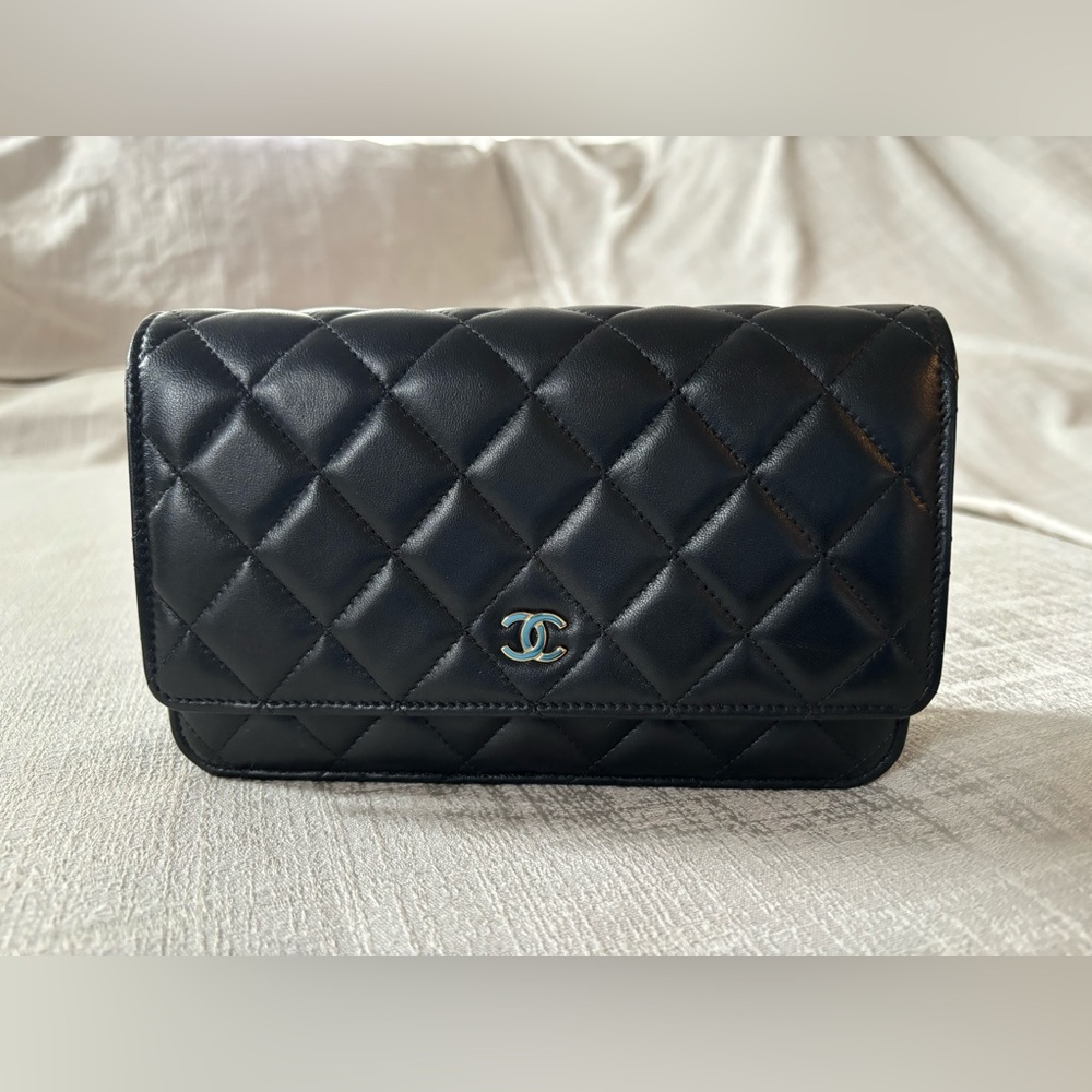 Authentic black CHANEL quilted lambskin WOC wallet on chain gold hardware